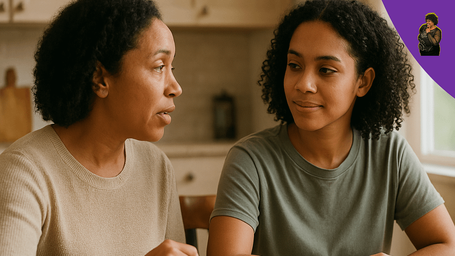 KG-KeishaGolder Parenting without Power Struggles BPImage2-1280x720 Parent and teen sit at a kitchen table. One is speaking, the other is listening and nodding attentively. The background is softly blurred for focus.