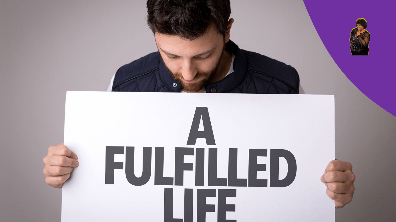 A Man holding a Poster board with Fulfilled life on it