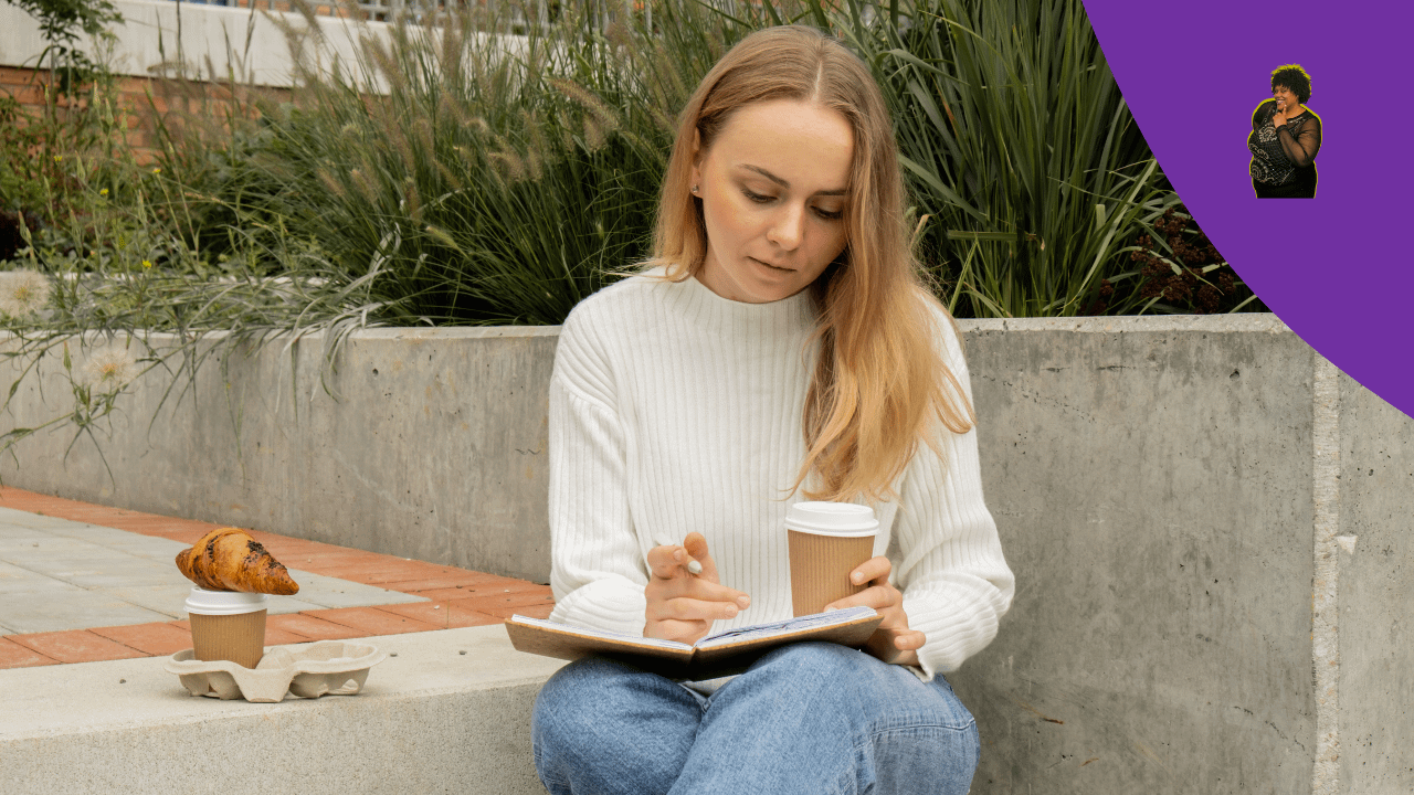 Women writing in journal 