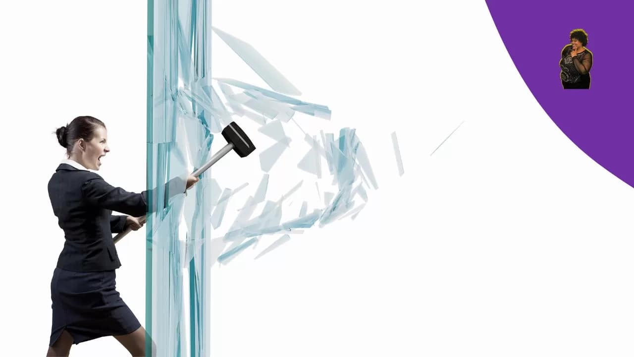 Woman breaking through glass 